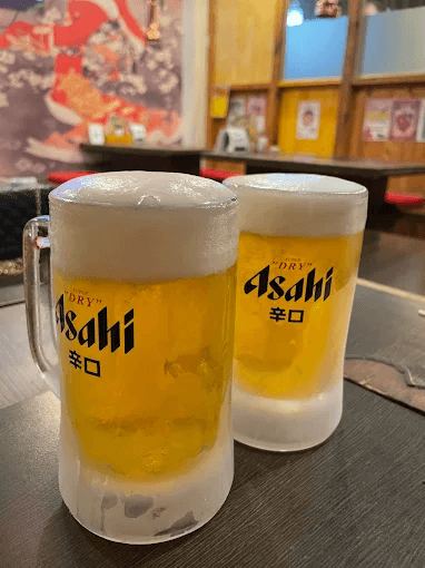 Premium beef set on charcoal BBQ grill — Izakaya Baku